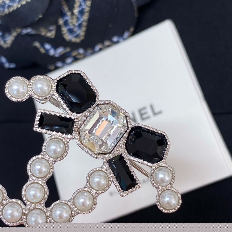 Ch*el brooches